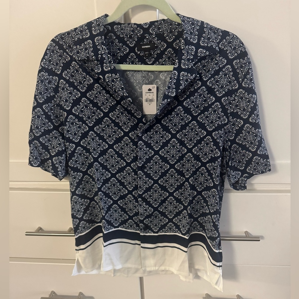 Men’s short sleeve shirt new w/tags
Rayon material